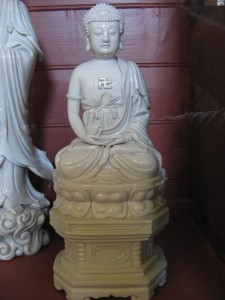 Chinese Ceramic Statue with Swastika
